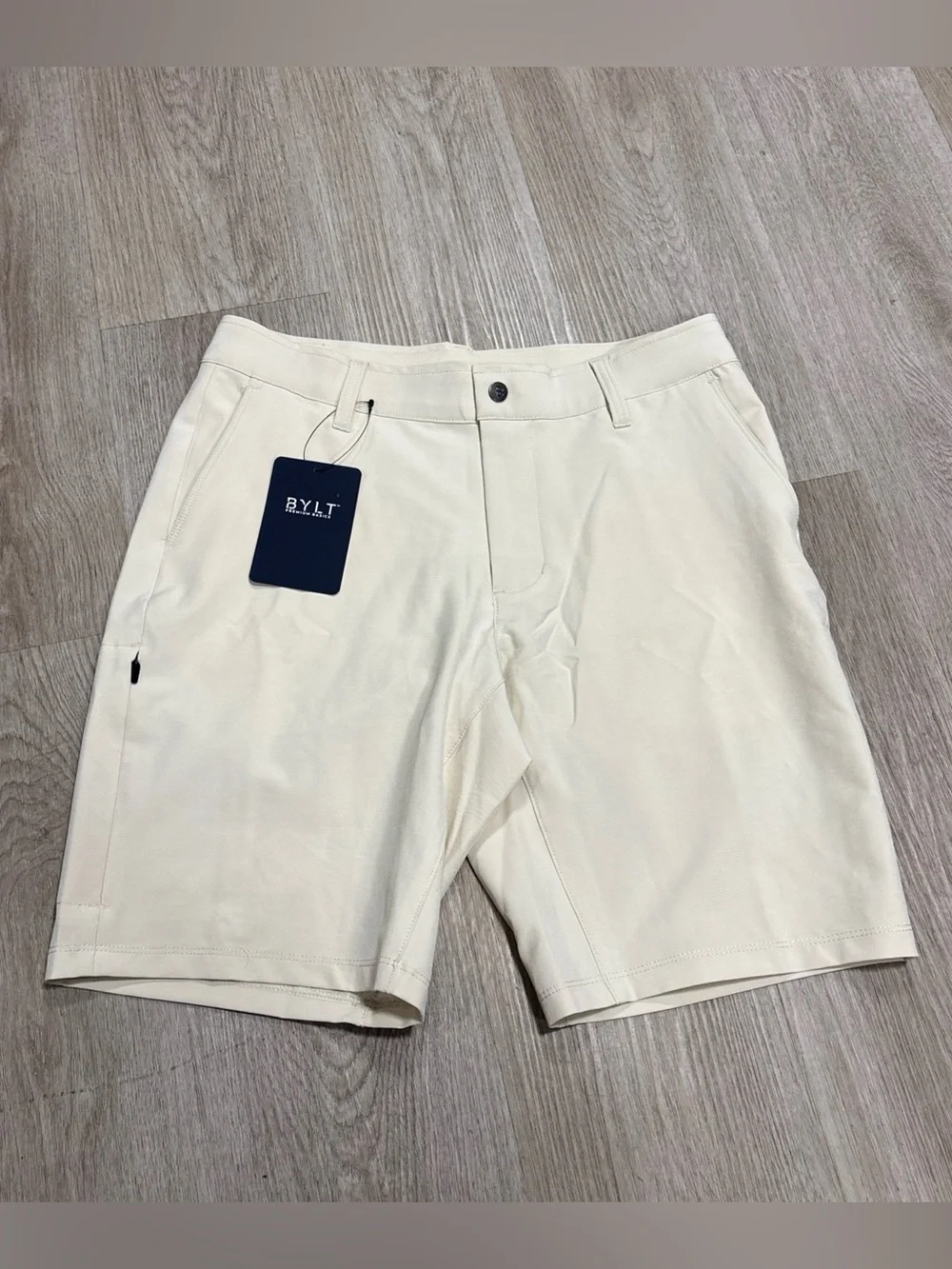 BYLT Basics Shorts Mens 32 Bone Tan Kinetic Stretch Zip Pocket Flat Front NWT